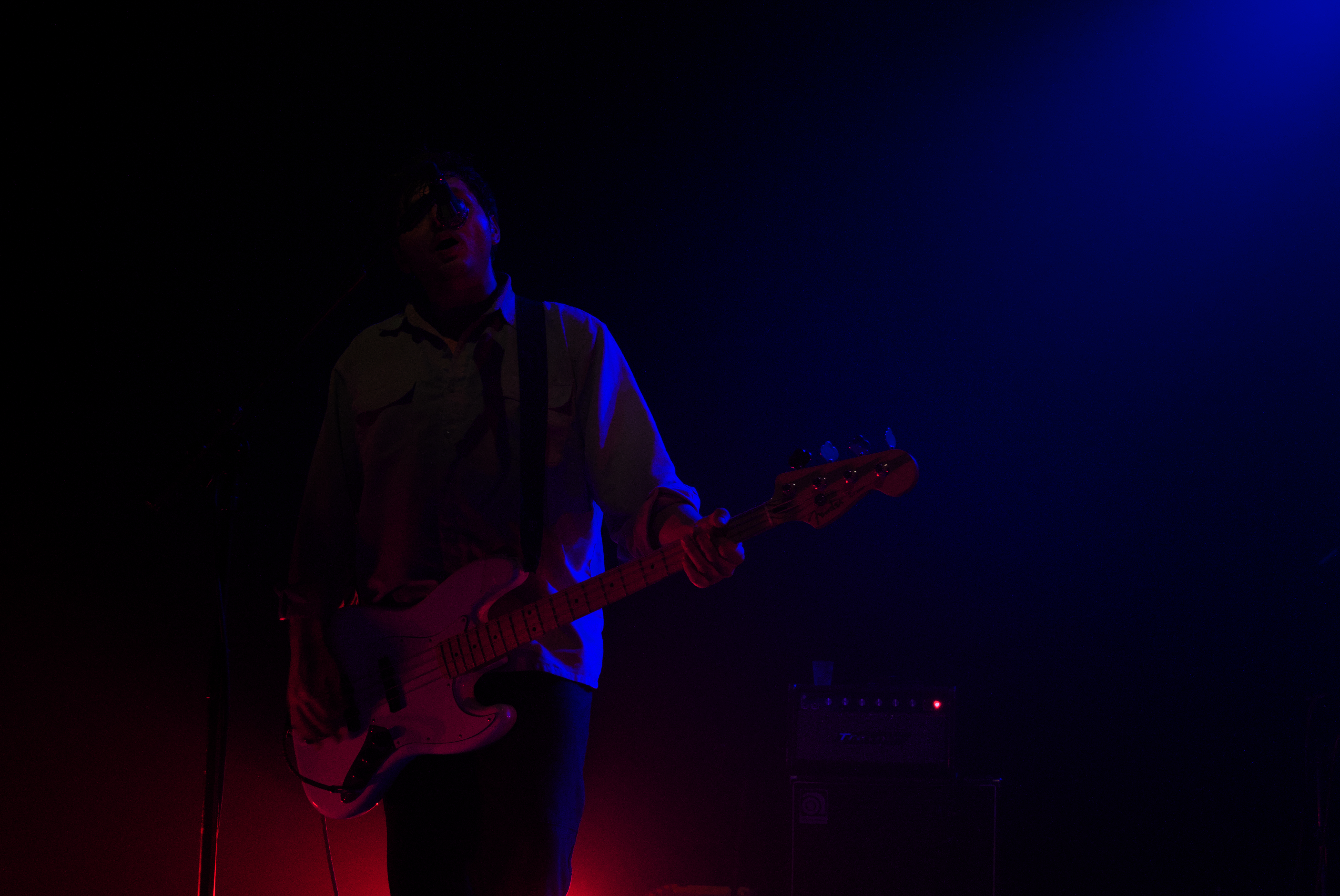 Vundabar's Brandon playing guitar in blue light