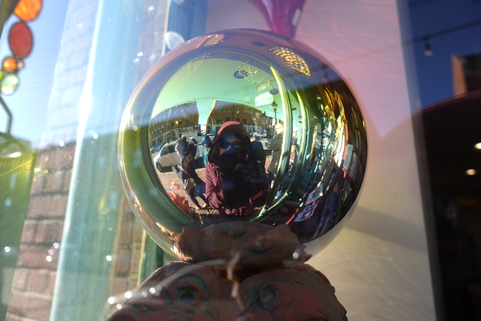 Taking a photo of myself in a shiny orb